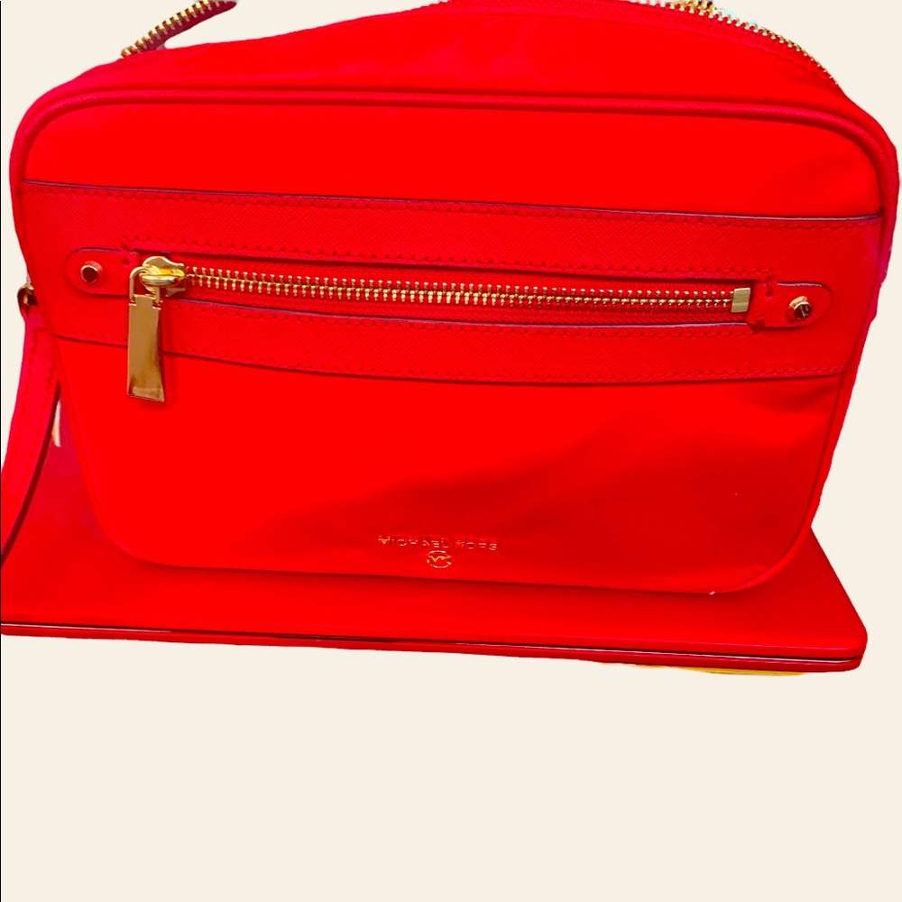 A red mk bag